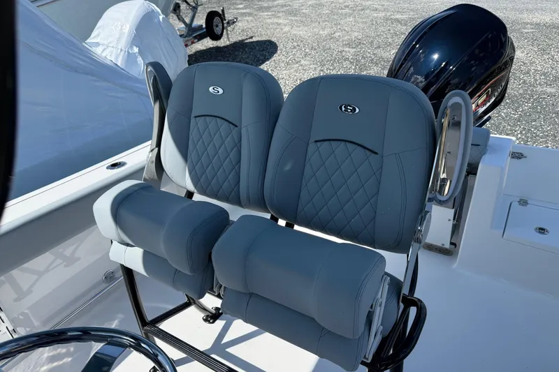 Slide: The Image of 2026 Sportsman Open 232 Center Console boat seats with quilted design and sleek finish. - 7