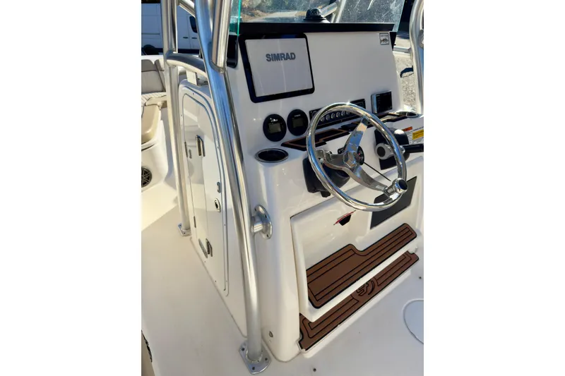 Slide: The Image of 2018 Sea Fox 248 Commander boat console with steering wheel and Simrad display. - 12