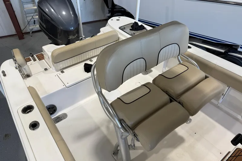 Slide: The Image of 2018 Sea Fox 248 Commander boat interior with seating and Yamaha 250 engine. - 22