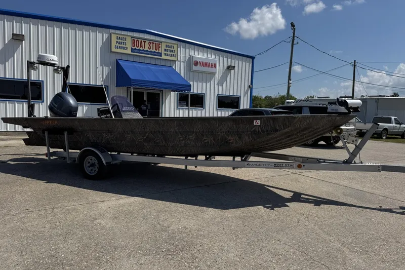 The Image of 2022 Alweld 2270 Large Flat Bottom boat on trailer outside dealership. - 0