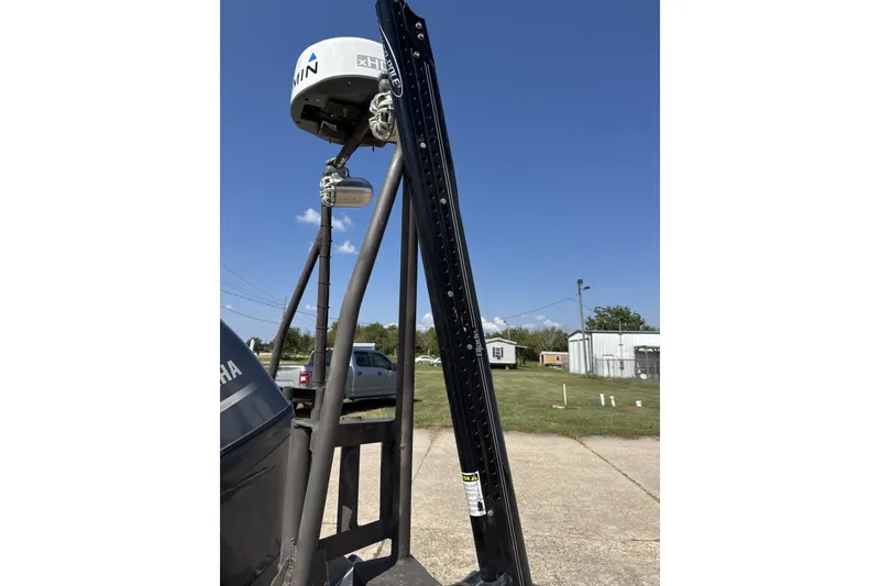 Slide: The Image of 2022 Alweld 2270 Large Flat Bottom boat with radar equipment, outdoor setting. - 6