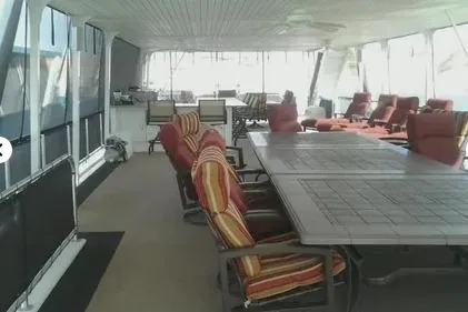 Slide: The Image of Spacious 2007 Sumerset Steelaway houseboat deck with seating and tables. - 3