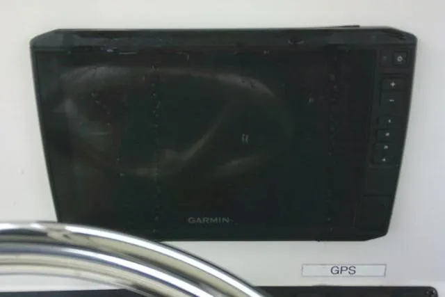 Slide: The Image of Garmin GPS device on 2020 Stingray 216 CC boat dashboard. - 29