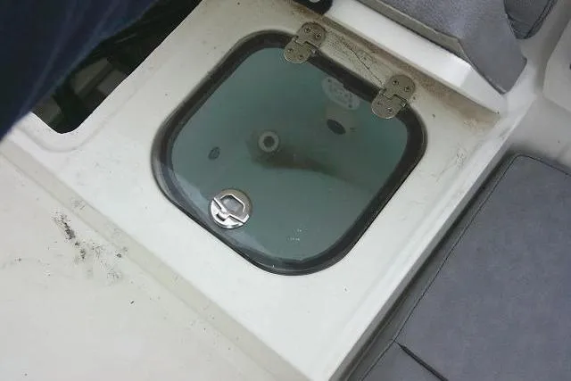 Slide: The Image of Livewell compartment on a 2020 Stingray 216 CC boat. - 39