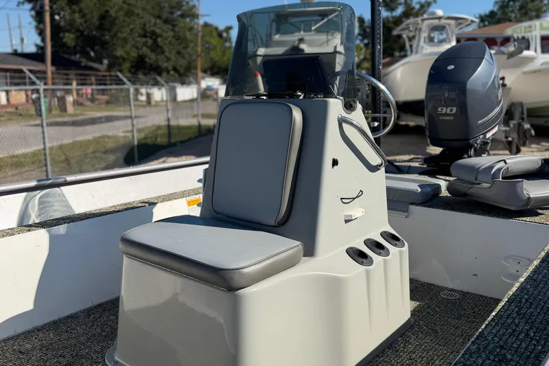 Slide: The Image of 2013 G3 1860 CC Deluxe boat interior with steering console and Yamaha outboard motor. - 13