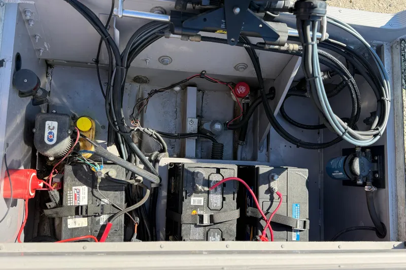 Slide: The Image of Electrical components and wiring inside a 2013 G3 1860 CC Deluxe boat. - 15