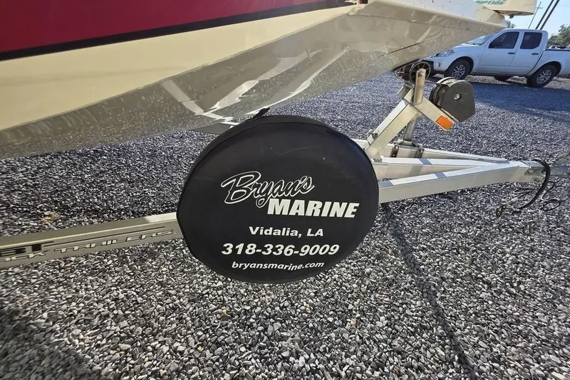 Slide: The Image of 2016 Xpress H20B Bay boat trailer with Bryan's Marine tire cover, Vidalia, LA. - 9