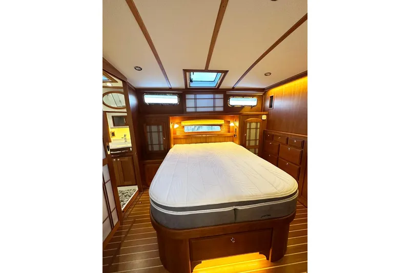 Slide: The Image of Luxurious bedroom interior of 2018 Sabre 48 Flybridge Sedan yacht. - 15