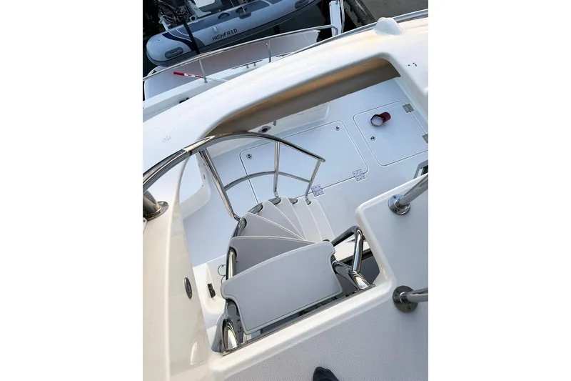Slide: The Image of Staircase on 2018 Sabre 48 Flybridge Sedan yacht, featuring sleek design and modern amenities. - 5