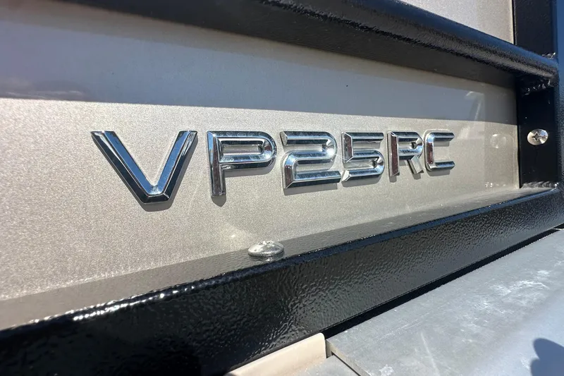Slide: The Image of 2024 Veranda VP 25RC model emblem on metallic surface. - 9