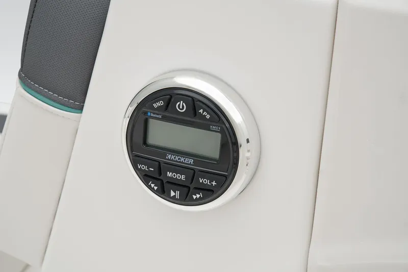 Slide: The Image of Manufacturer Provided Image: 2025 Tahoe T16 boat audio control panel with digital display and buttons. - 22