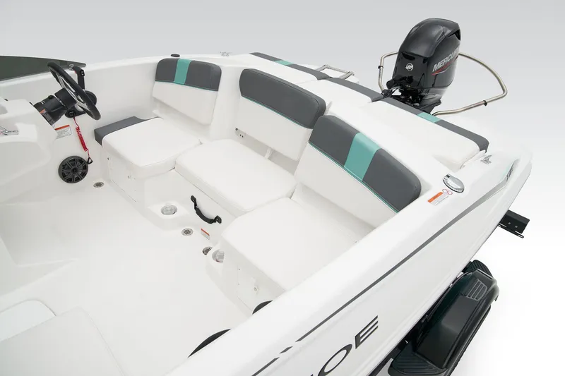 Slide: The Image of Manufacturer Provided Image: 2025 Tahoe T16 boat interior with cushioned seating and outboard motor. - 23