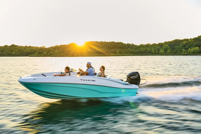 Slide: The Image of Manufacturer Provided Image: 2025 Tahoe T16 boat cruising on a lake at sunset with passengers enjoying the ride. - 44