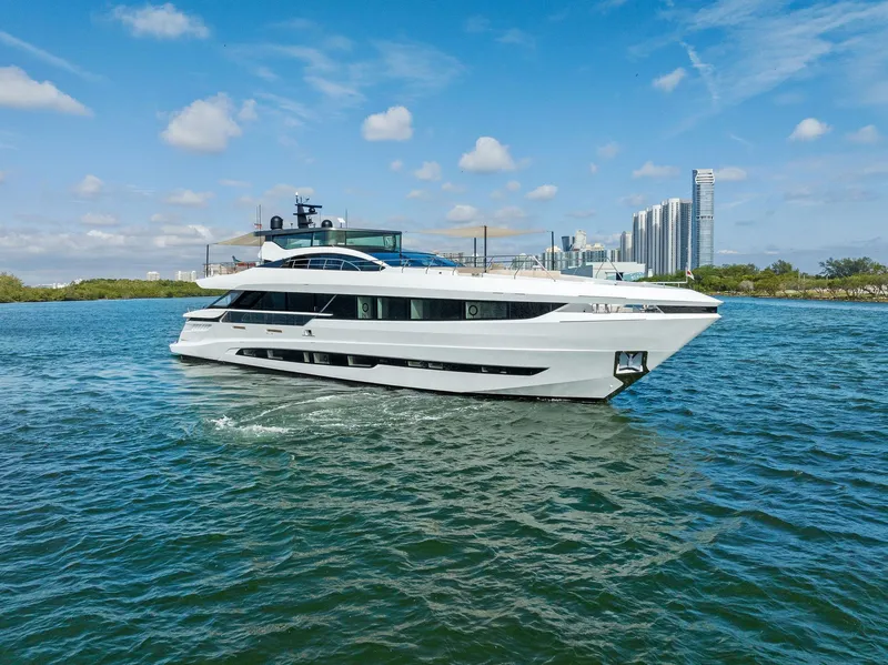 The Image of Luxury Mangusta 109 yacht cruising in clear blue waters, 2020 model. - 0