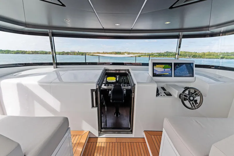 Slide: The Image of Modern helm station of 2020 Mangusta 109 yacht with advanced navigation systems. - 15