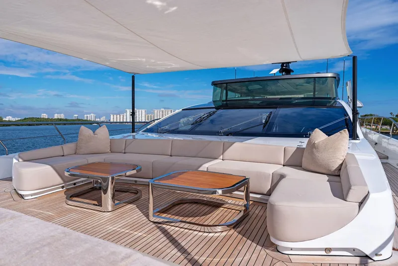 Slide: The Image of Luxurious 2020 Mangusta 109 yacht with spacious outdoor seating and modern design. - 25