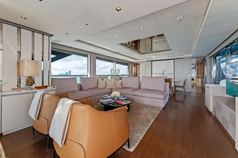 Slide: The Image of Luxurious interior of 2020 Mangusta 109 yacht with modern furnishings and panoramic windows. - 28