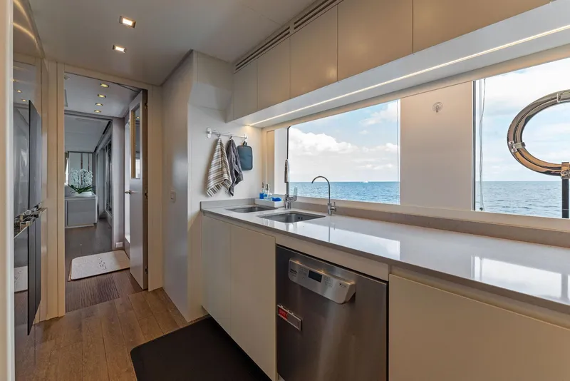 Slide: The Image of Modern kitchen interior on a 2020 Mangusta 109 yacht with ocean view. - 39