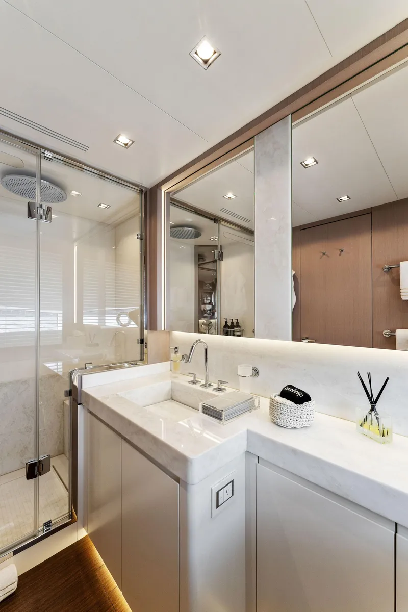 Slide: The Image of Modern bathroom on 2020 Mangusta 109 yacht with glass shower and sleek fixtures. - 47
