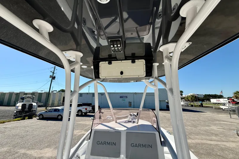 Slide: The Image of 2021 BlackJack 256 Bay boat with Garmin electronics, viewed from the helm under T-top. - 15