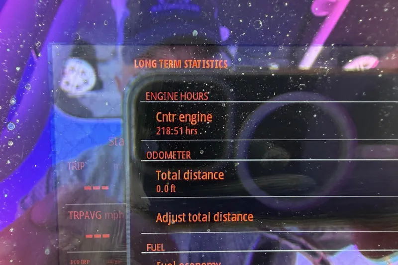 Slide: The Image of Display screen showing engine hours and odometer for 2021 BlackJack 256 Bay boat. - 23