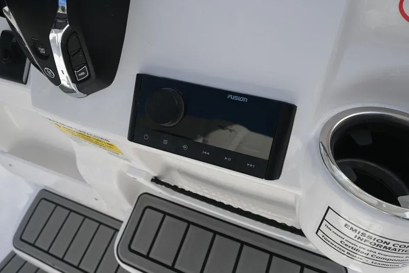 Slide: The Image of Control panel of 2026 Tidewater 2210 Carolina Bay boat with Fusion audio system. - 25