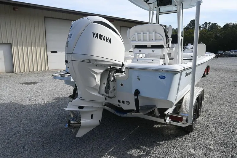 Slide: The Image of 2026 Tidewater 2210 Carolina Bay boat with Yamaha outboard engine on trailer. - 6
