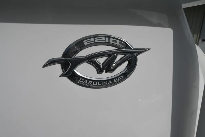 Slide: The Image of Tidewater 2210 Carolina Bay 2026 emblem on a sleek white surface. - 7