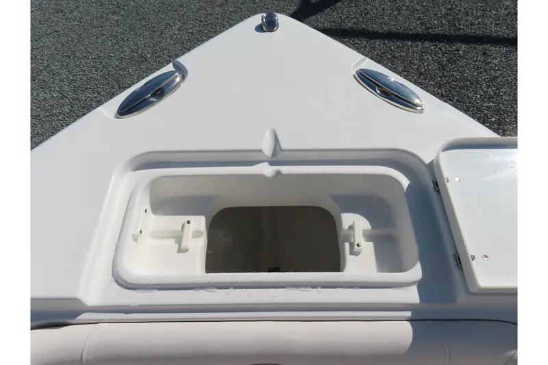 Slide: The Image of Bow storage compartment on 2020 Sea Hunt Ultra 255 SE boat. - 15