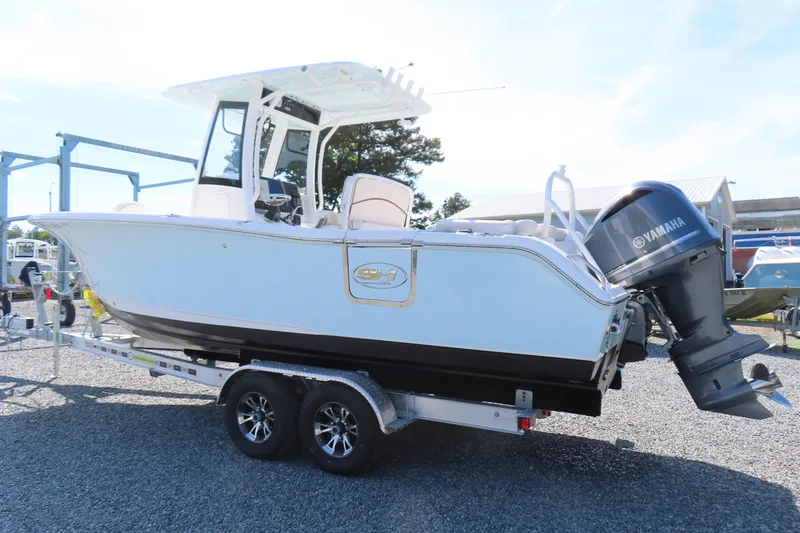 Slide: The Image of 2020 Sea Hunt Ultra 255 SE boat on trailer with Yamaha engine. - 2