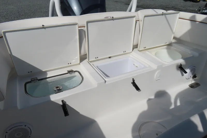 Slide: The Image of 2020 Sea Hunt Ultra 255 SE boat storage compartments and livewell. - 37