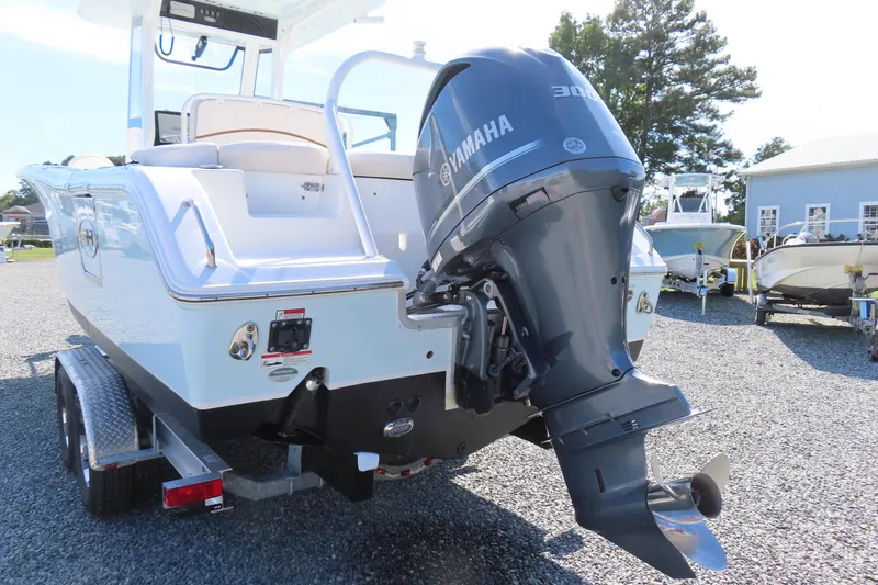 Slide: The Image of 2020 Sea Hunt Ultra 255 SE boat with Yamaha 300 outboard motor on trailer. - 4