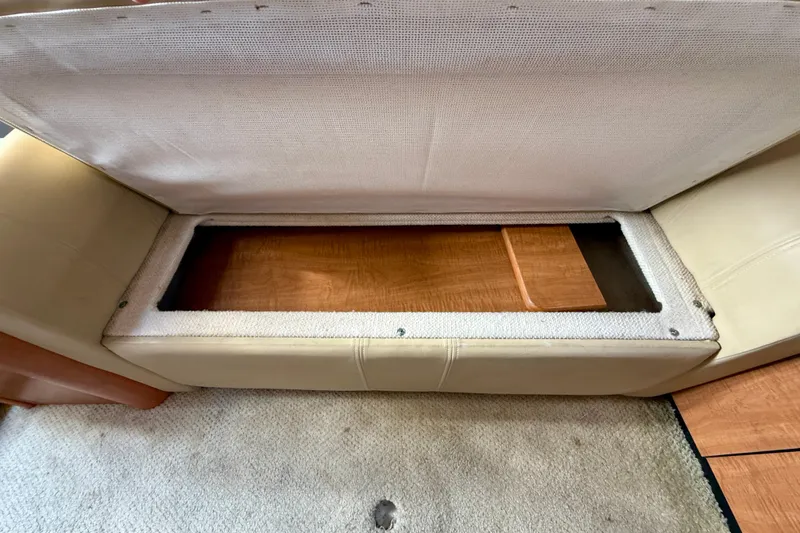 Slide: The Image of Open storage compartment in 2006 Sea Ray 290 Sundancer boat interior. - 19