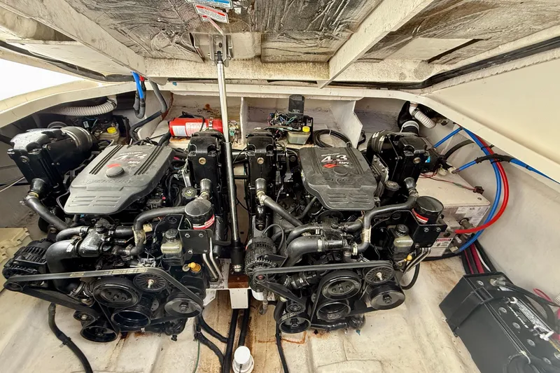 Slide: The Image of Engine compartment of 2006 Sea Ray 290 Sundancer with dual MerCruiser engines. - 40