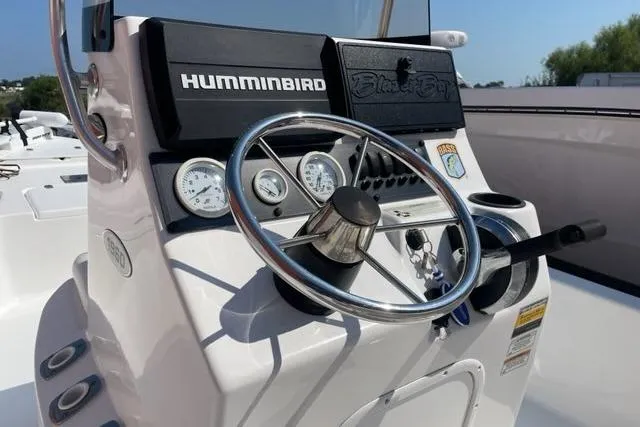Slide: The Image of Steering console of 2016 Blazer Bay 1960 boat with Humminbird electronics. - 4