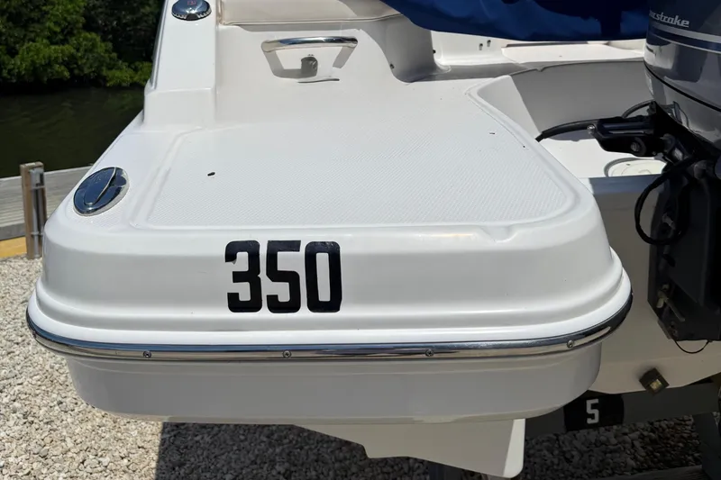 Slide: The Image of 2016 Chaparral 230 Suncoast boat with number 350 on the stern. - 19