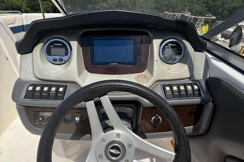 Slide: The Image of Dashboard of 2016 Chaparral 230 Suncoast boat with Yamaha gauges and Garmin display. - 22