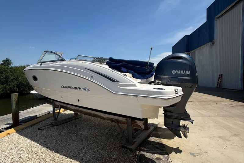 Slide: The Image of 2016 Chaparral 230 Suncoast boat with Yamaha engine on dry dock. - 5