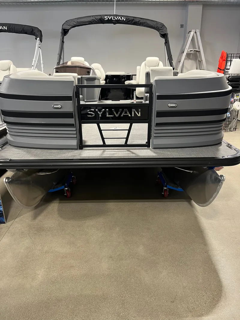 Slide: The Image of 2026 Sylvan R-20 PARTY FISH pontoon boat in a showroom. - 1