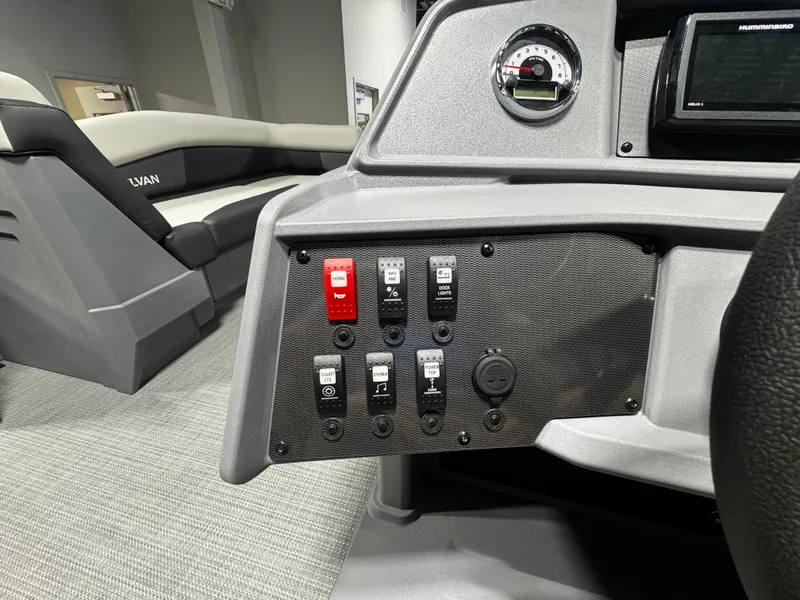 Slide: The Image of Dashboard of 2026 Sylvan R-20 PARTY FISH with switches and gauges. - 12