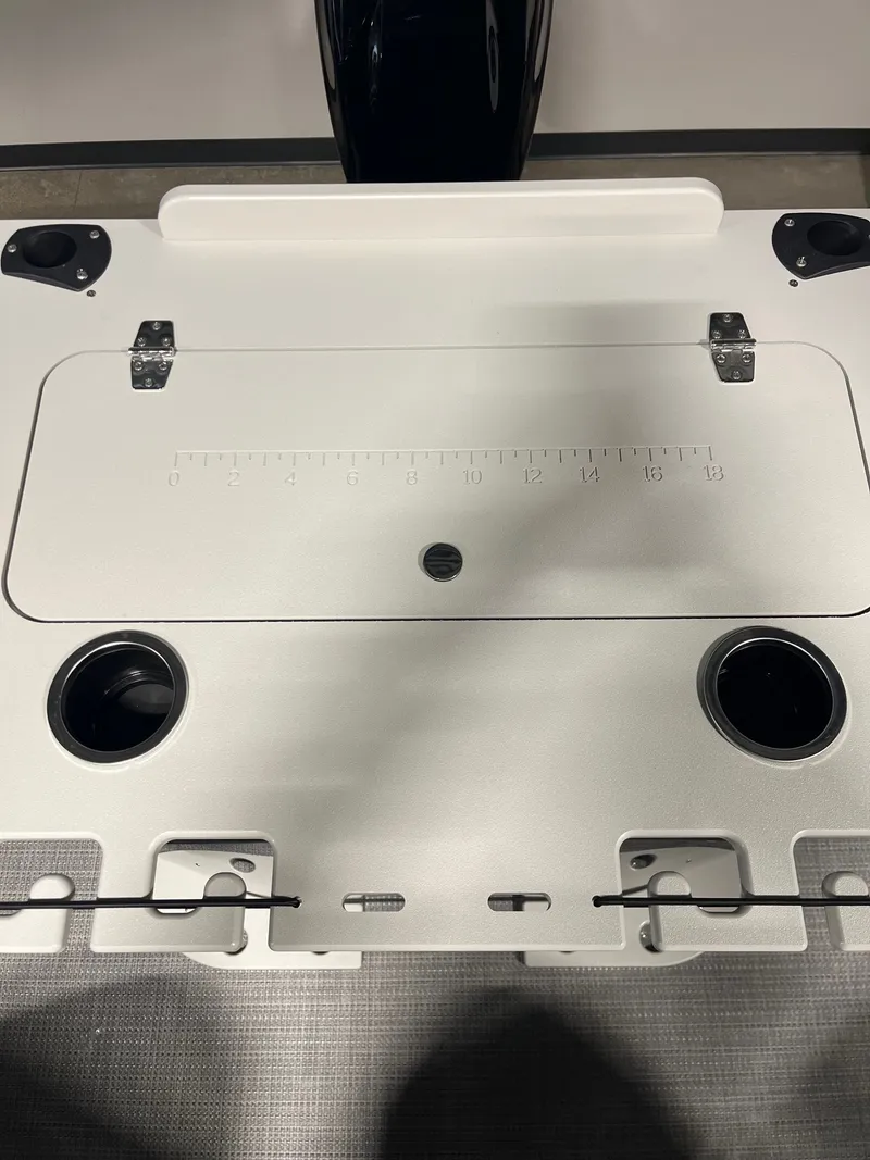 Slide: The Image of Sylvan R-20 PARTY FISH 2026 boat table with cup holders and ruler. - 6