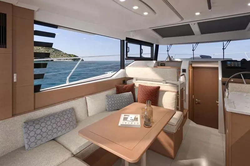 Slide: The Image of Luxurious interior of 2026 Beneteau Swift Trawler 37 with ocean view. - 19