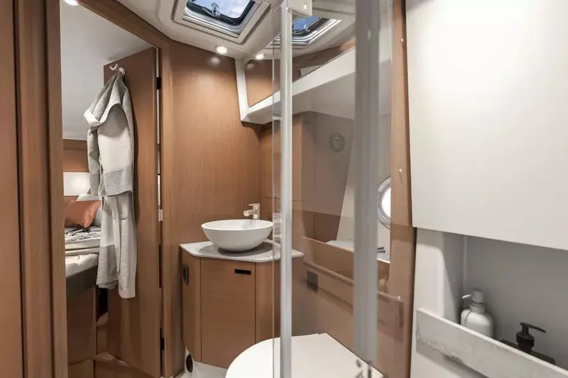 Slide: The Image of Luxurious bathroom interior of 2026 Beneteau Swift Trawler 37 with modern fixtures. - 24