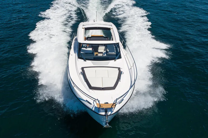 Slide: The Image of 2024 Bavaria SR38 yacht cruising on open water, showcasing sleek design and powerful performance. - 14