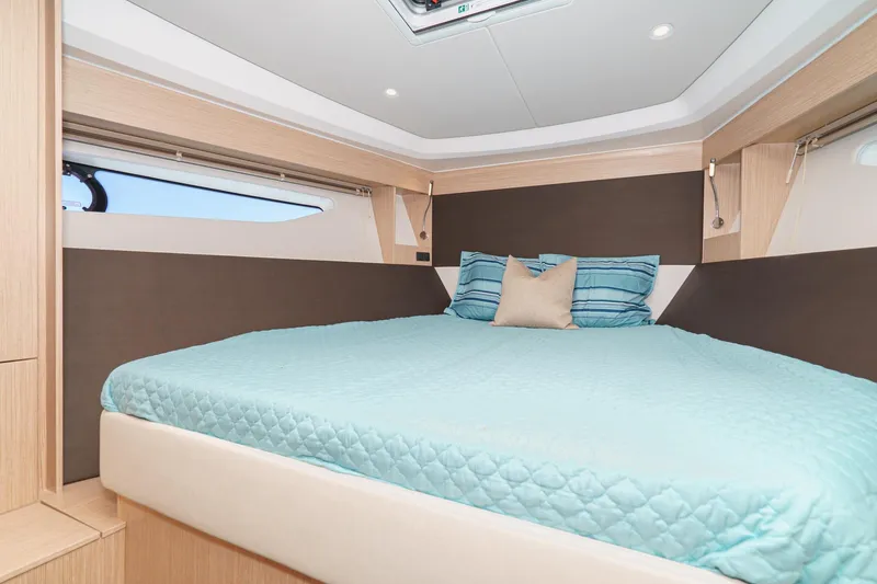 Slide: The Image of Luxurious cabin interior of 2024 Bavaria SR38 yacht with cozy bedding. - 40