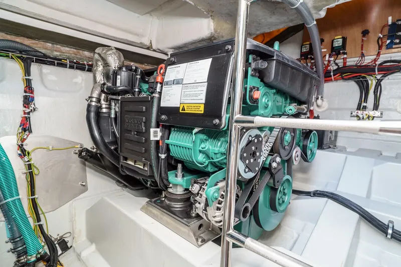 Slide: The Image of Engine room of 2024 Bavaria SR38 yacht, featuring a Volvo Penta engine. - 48