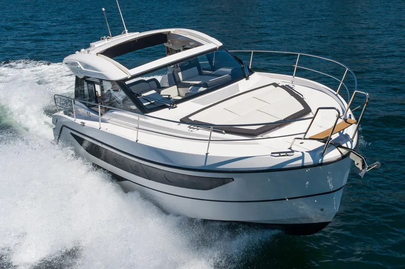 Slide: The Image of 2024 Bavaria SR38 yacht cruising on open water, showcasing sleek design and performance. - 9