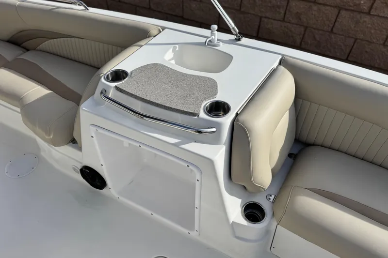 Slide: The Image of Interior of 2013 NauticStar 203 SC boat with seating and cup holders. - 20