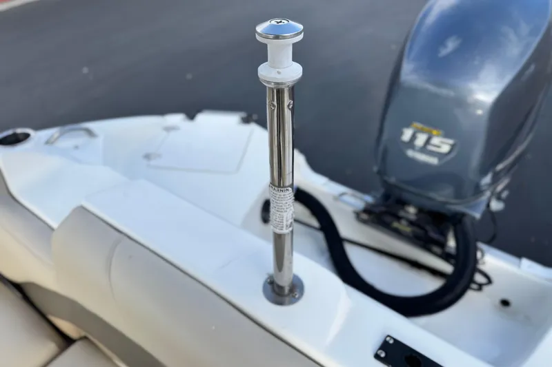 Slide: The Image of 2013 NauticStar 203 SC boat with Yamaha 115 outboard motor, rear deck view. - 27