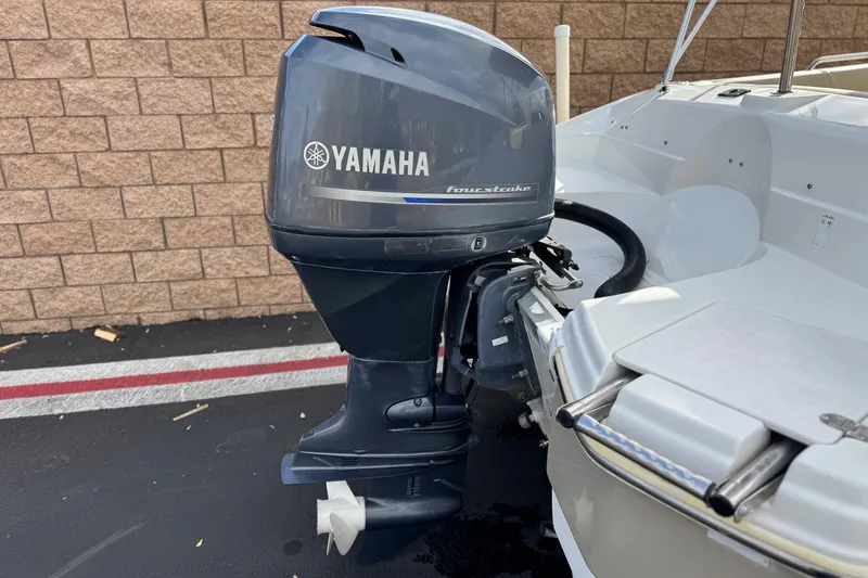 Slide: The Image of 2013 NauticStar 203 SC boat with Yamaha four-stroke outboard motor. - 6